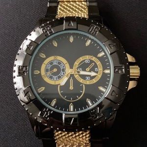 Men’s black and gold watch